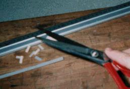 cutting the paper sticking off